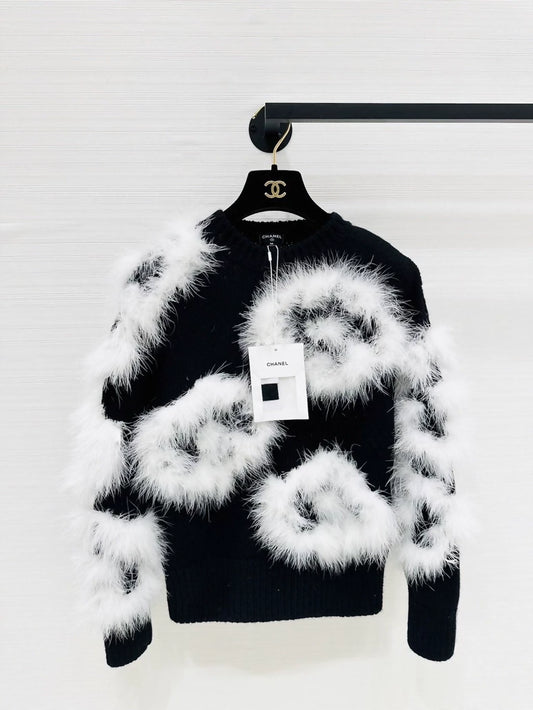 Chanel 23K black and white knit top