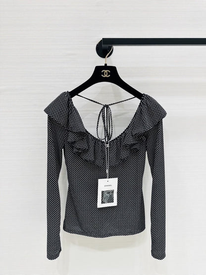 Chanel 24b top with ruffles and double C logo