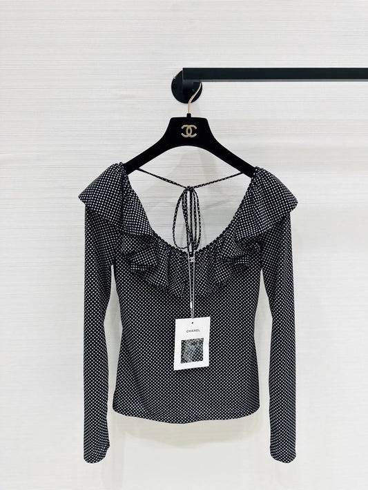 Chanel 24b top with ruffles and double C logo