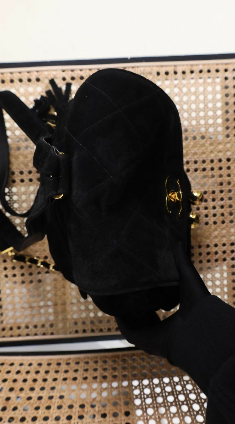 Chanel black sued backpack with gold hardware