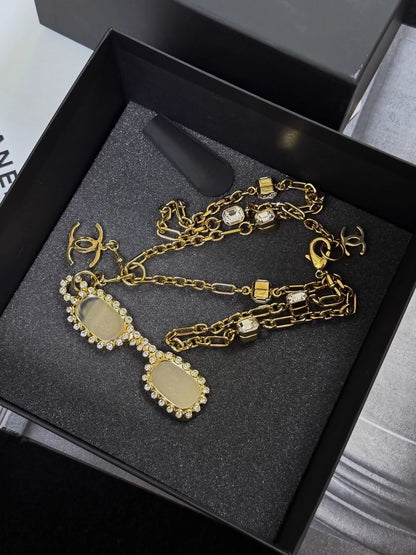 Chanel 24s gold-plated sunglasses-style long chain necklace