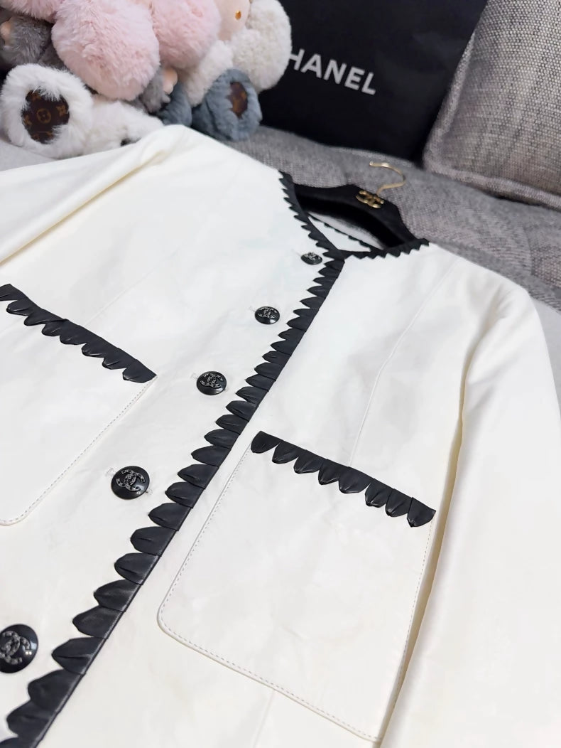 Chanel 21C Off-White Lambskin Leather Jacket with Black Trim