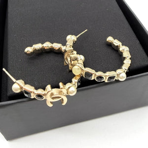 Chanel black diamond and pearl hoop earrings