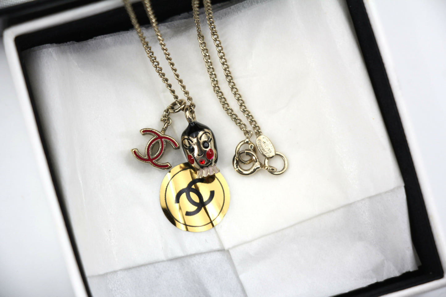 Chanel Vintage 05P Metal Doll Head & Red CC Necklace
