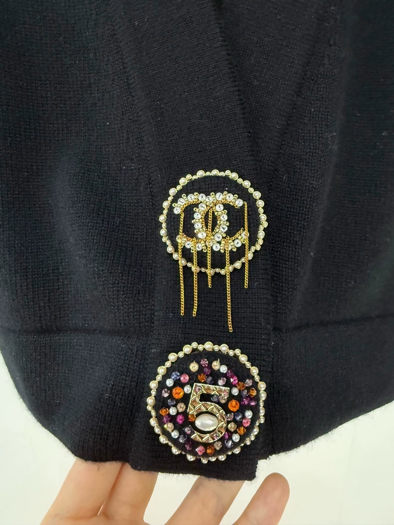 Chanel 22A black knitted vest with charms