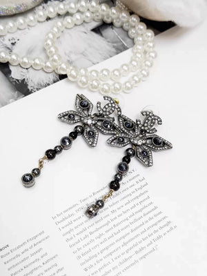 Chanel Métiers d'Art silver butterfly long stud earrings