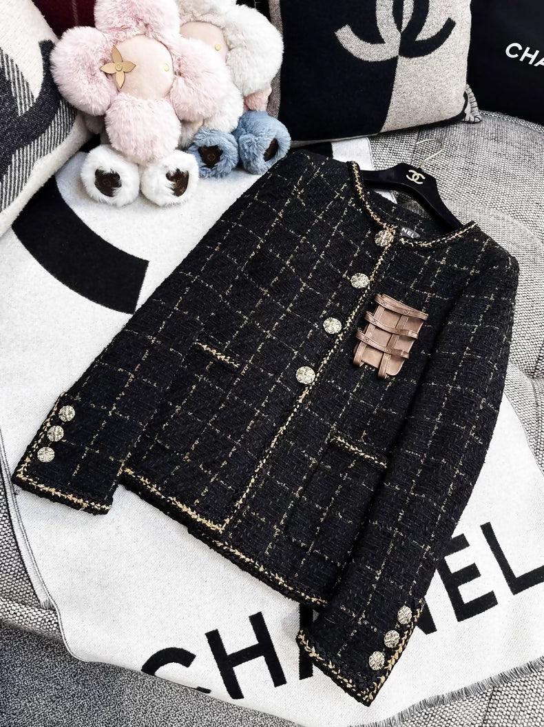 Chanel 16k black and gold tweed and leather jacket