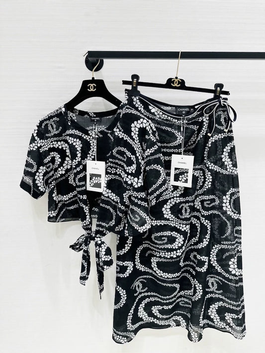 Chanel 25M Coco Beach set black print top & pant