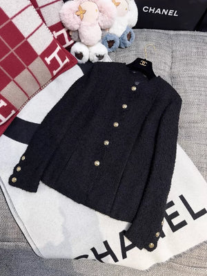 Chanel 20k black tweed jacket