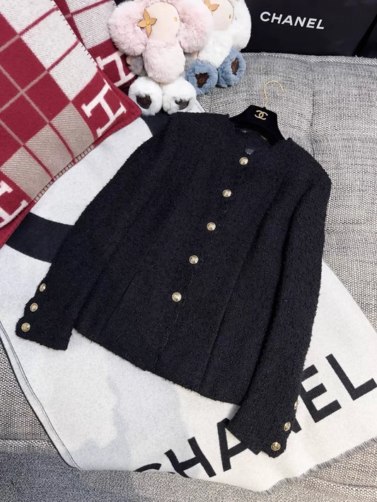 Chanel 20k black tweed jacket
