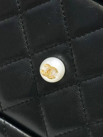 Chanel Métiers d'Art collection, classic black lambskin quilted jewelry case, large size,