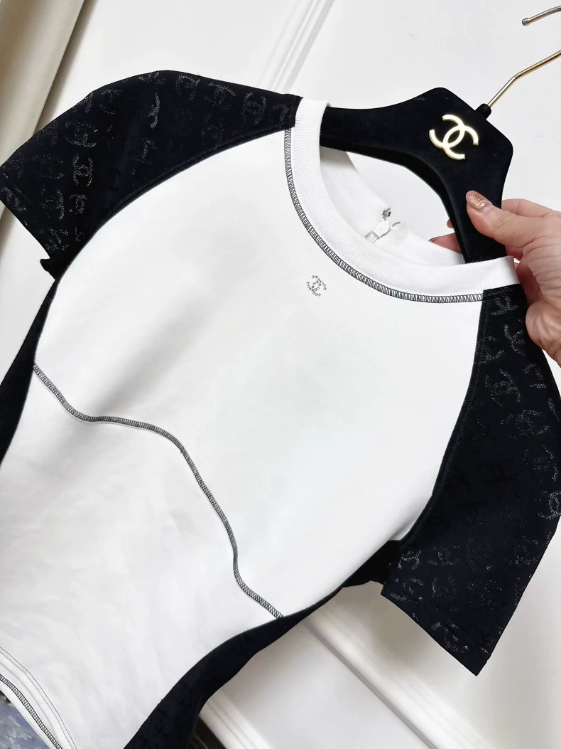 Chanel 24c white and black top