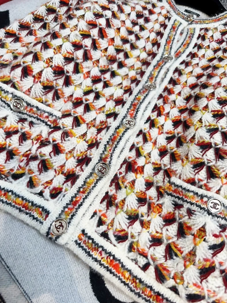 Chanel 23A tweed jacket in brown, orange, and white