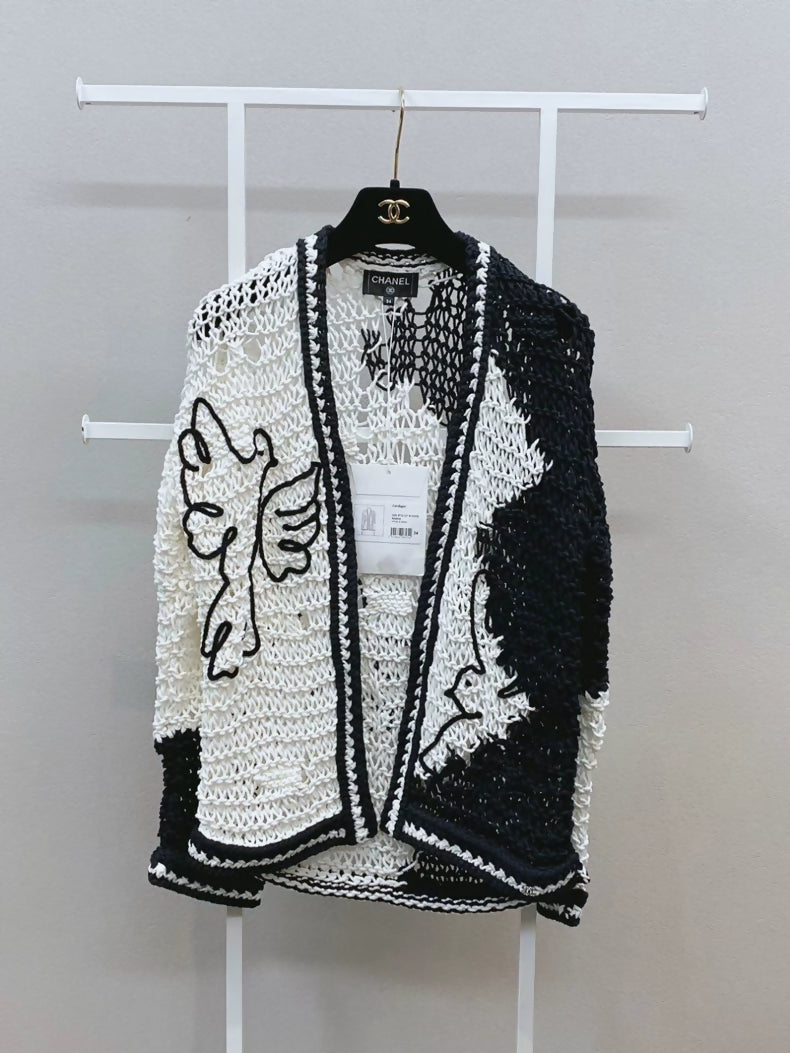 CHANEL 22C "Dove of Peace" white and black cardigan