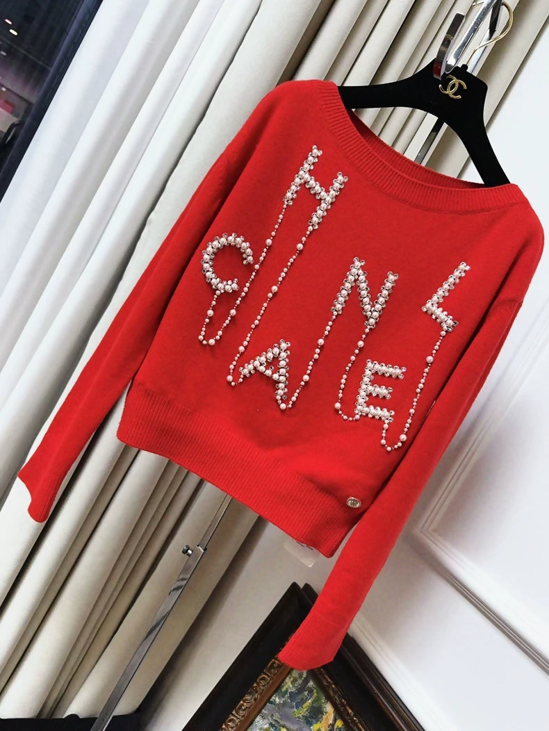 Chanel 21S red sweater