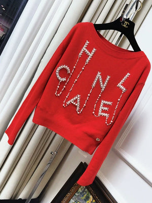 Chanel 21S red sweater