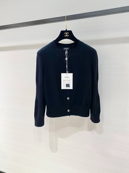 Chanel 24B black cashmere Turnlock buttons cardigan