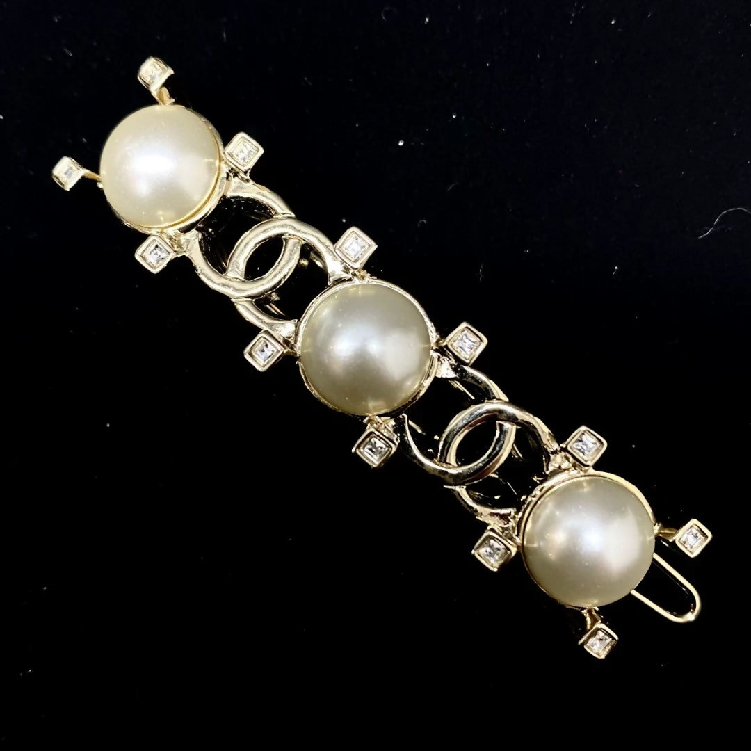 Chanel 21A pearl inlaid double C hairpin