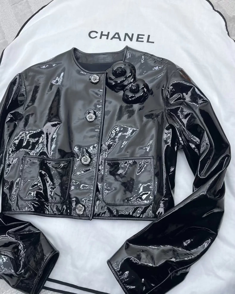 Chanel 23K black patent leather camellia jacket