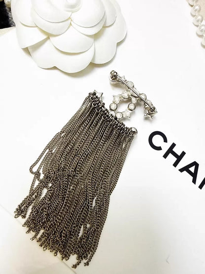 Chanel 17B pearl star double C tassel brooch