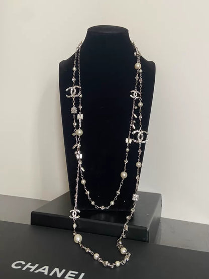 Chanel starry rhinestone encrusted sweater chain