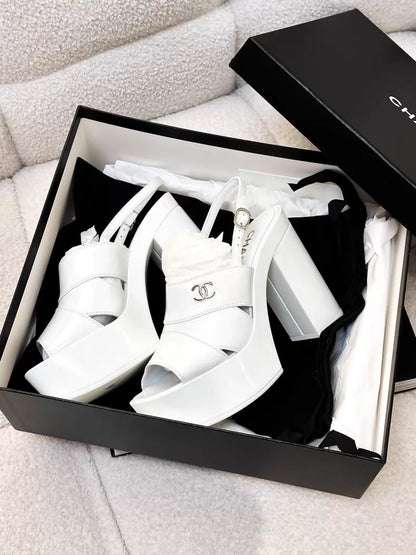 Chanel 23A white patent leather platform pumps