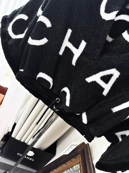 Chanel 23M black and white CC terry cloth top