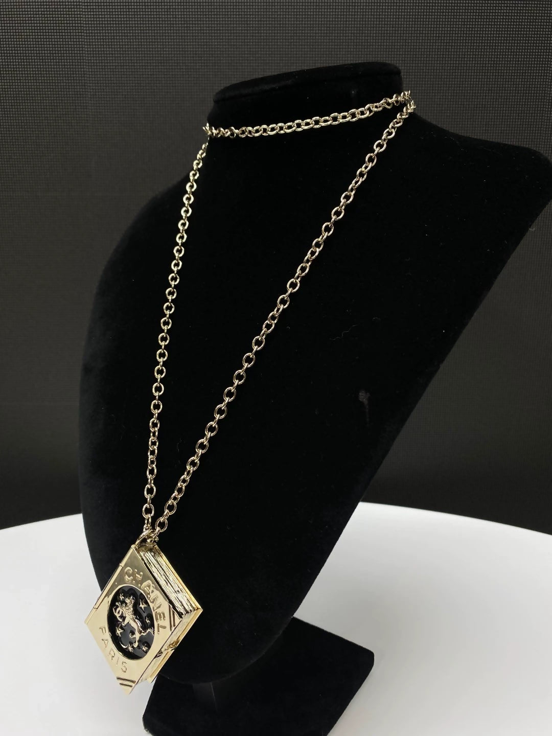 Chanel 22P lion magic book long necklace
