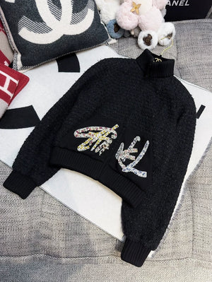 Chanel 22A black tweed jacket