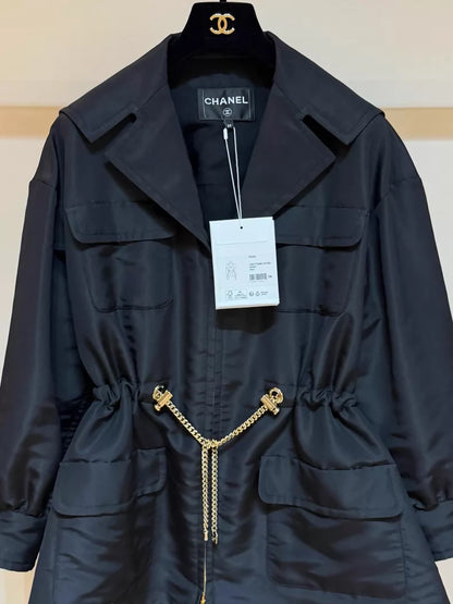 Chanel 23K black trench coat with gold chain details