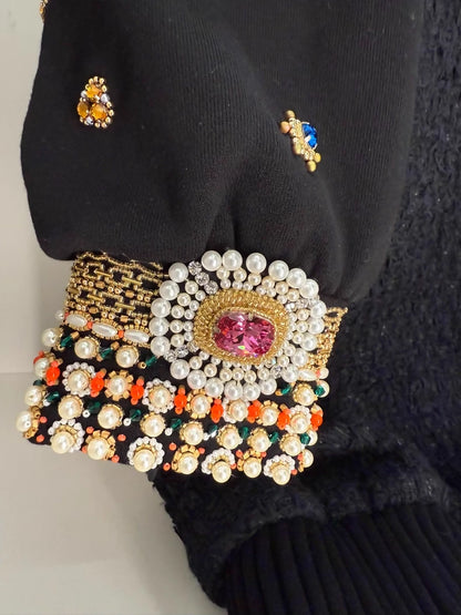 Chanel 22A jacket with ruby-embellished sleeves