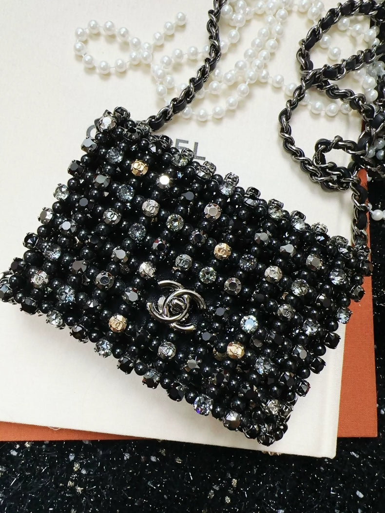 Chanel 22C black mini chain bag