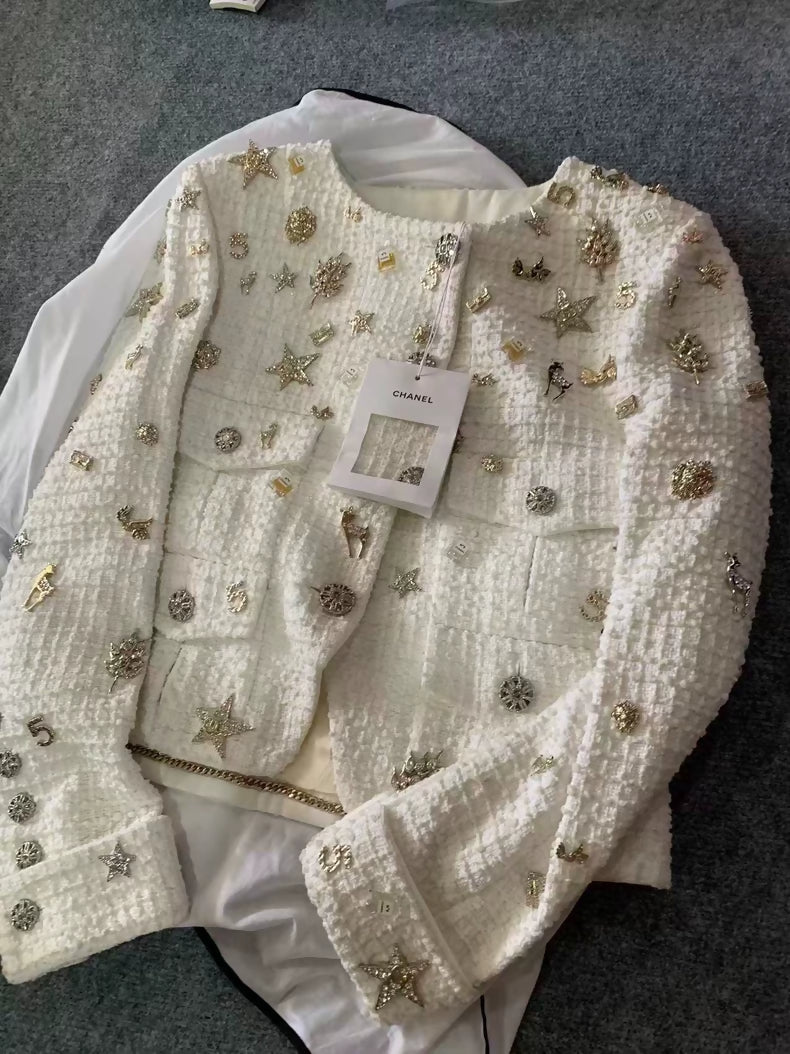 Chanel 22C ecru tweed with gold charms jacket