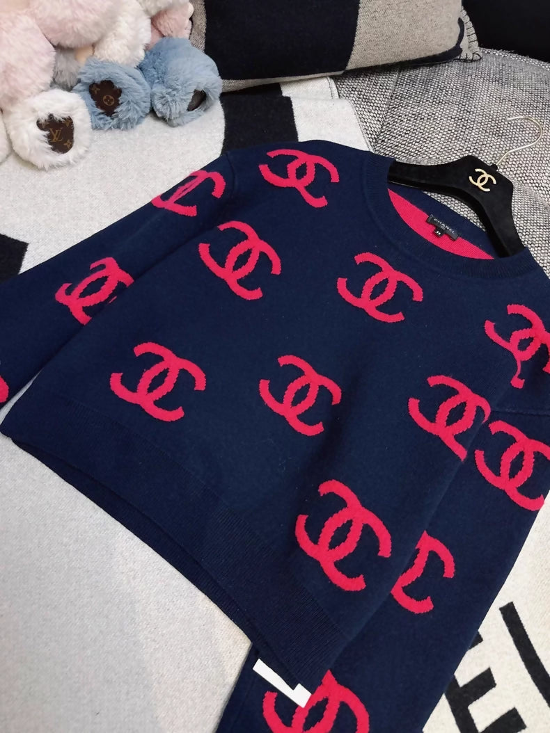 Chanel 21p navy blue and pink CC sweater