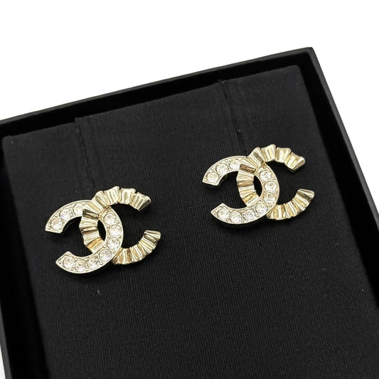 Chanel sparkling diamond wave double C earrings
