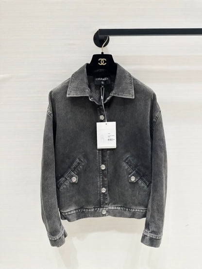 Chanel's popular black and grey denim jacket with logo detailing