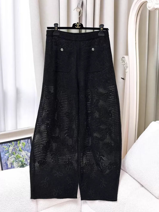 Chanel 23S black knit wide-leg pants with rhinestone buttons