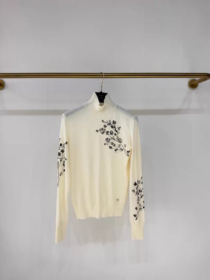 Chanel 22K ecru beaded camellia wool turtleneck top