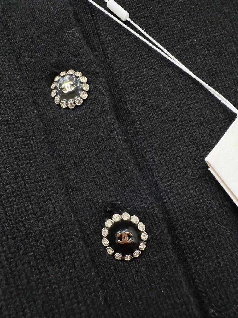 Chanel 25k black bow-tie knit cardigan