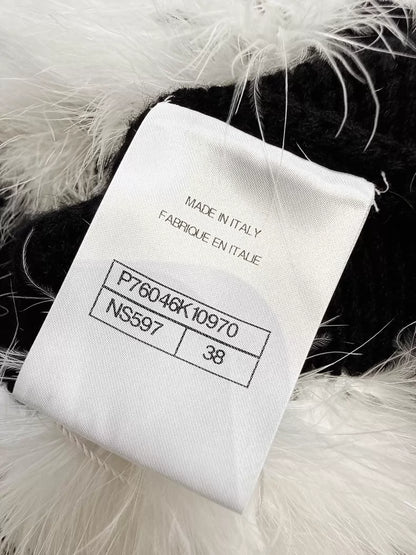 Chanel 23K white ostrich feather black camellia sweater