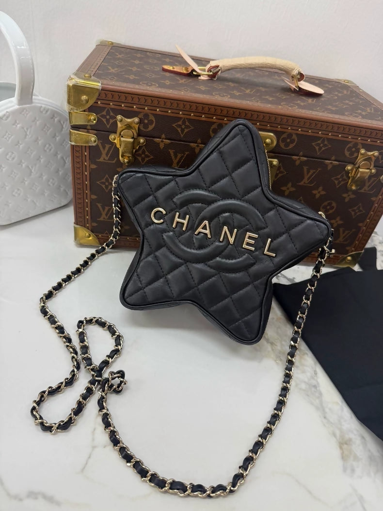 Chanel 24c star bag in black leather gold hardware