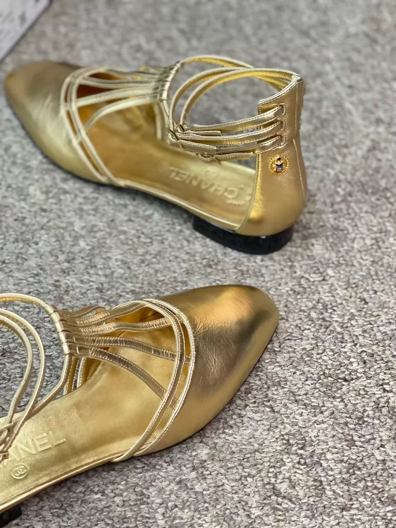 Chanel Karl Lagerfeld gold shoes