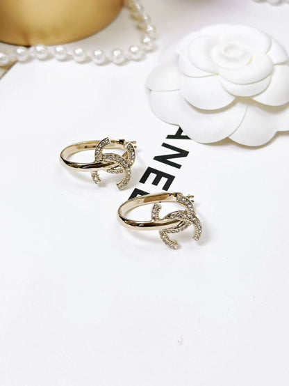 Chanel 22 gold double C logo diamond hoop earrings