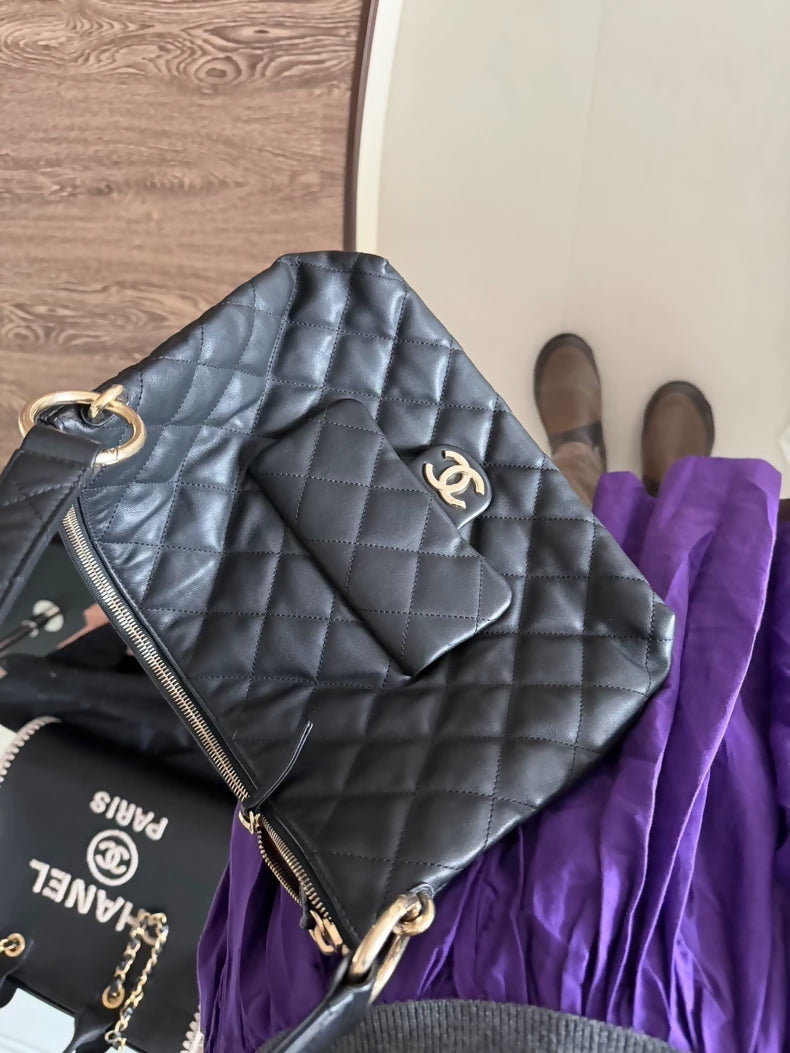 Chanel 23B hobo bag, black and gold, small size