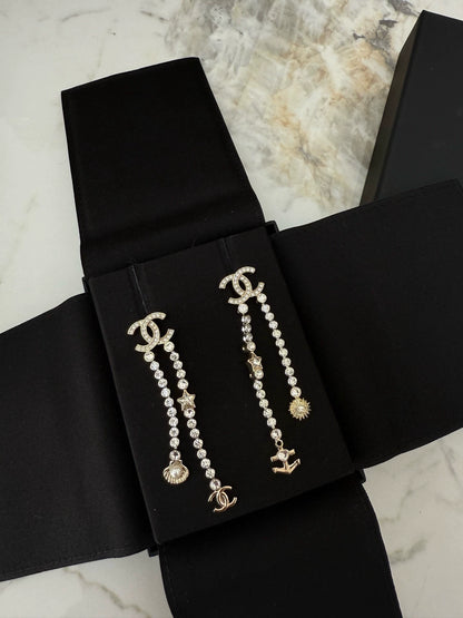 Chanel 25C shell star rhinestone tassel earrings