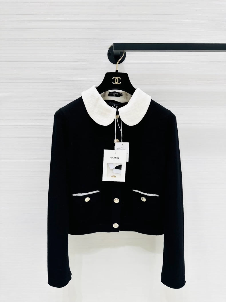 Chanel 25B black knit cardigan with white collar