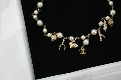 Chanel Vintage 05A Imitation Pearl Metal Rabbit Pendant Gold Necklace