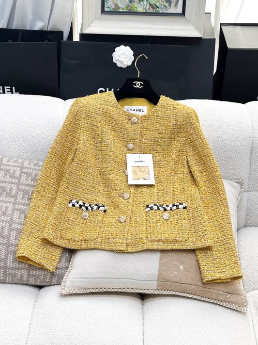 Chanel 23C gold and black/white sequined tweed jacket