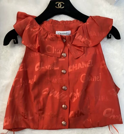Chanel Red Lettering Ruffled Sleeveless Top