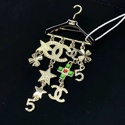 Chanel 23c rhinestone and glass pendant brooch